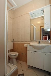 Kúpeľňa v ubytovaní Apartmani Radan