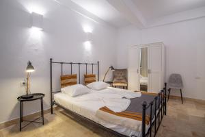 Postel nebo postele na pokoji v ubytování Hacienda De Mare