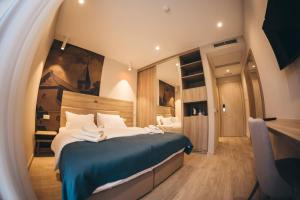 Postel nebo postele na pokoji v ubytování Hotel Verso