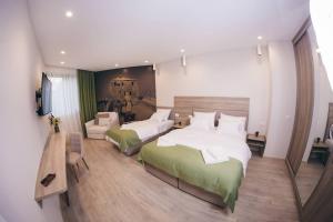 Postel nebo postele na pokoji v ubytování Hotel Verso