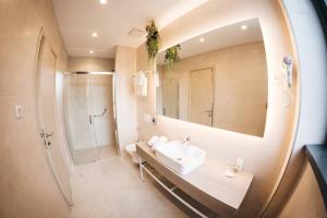 Koupelna v ubytování Hotel Verso