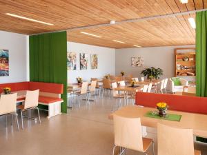 Reštaurácia alebo iné gastronomické zariadenie v ubytovaní Almenland Apartment Passail