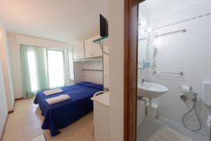 Koupelna v ubytování Hotel Ambra