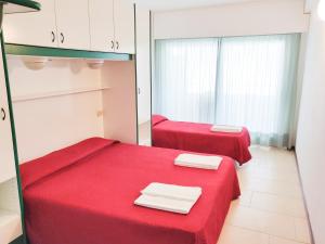 Postel nebo postele na pokoji v ubytování Hotel Ambra