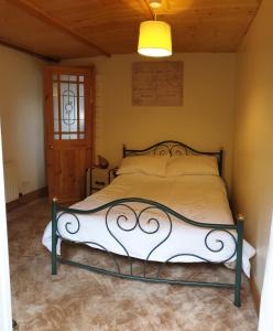 a bedroom with a bed in a room at Mona Villa Holiday Home in Coulderton
