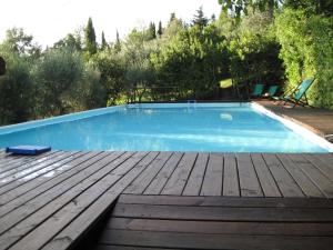 The swimming pool at or close to Fattoria il Leccio - Elegant Suite on Florence Hills