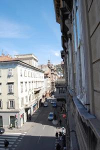 a view of a city street from a building at Affittacamere Berzi in Trieste