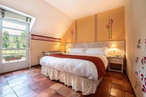 Postel nebo postele na pokoji v ubytování Hotel La Posada De Alameda