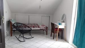Postel nebo postele na pokoji v ubytování lakazadom974 - Chambres d'Hôtes