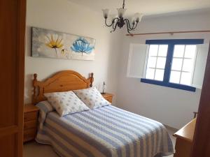 Postel nebo postele na pokoji v ubytování Casa El Salao