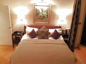 Gulta vai gultas numurā naktsmītnē 2 Bed Luxury apartment in Bayswater - amazing terrace views from 7th floor