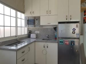 A kitchen or kitchenette at Apto/Suite Santa Cruz Tenerife