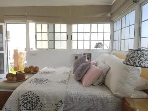 A bed or beds in a room at Apto/Suite Santa Cruz Tenerife