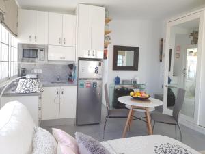 A kitchen or kitchenette at Apto/Suite Santa Cruz Tenerife