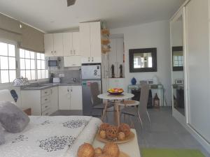 A kitchen or kitchenette at Apto/Suite Santa Cruz Tenerife