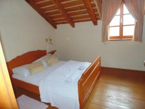 Posteľ alebo postele v izbe v ubytovaní Guest House Kozjak