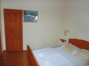 Posteľ alebo postele v izbe v ubytovaní Guest House Kozjak