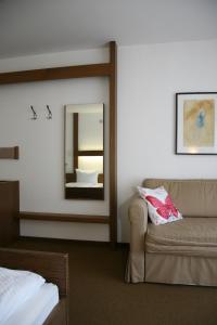 Postel nebo postele na pokoji v ubytování Hotel Pflug