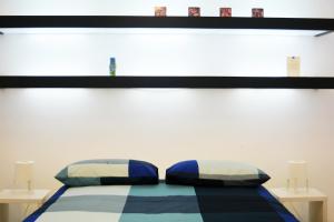 A bed or beds in a room at ZAGARA My Home