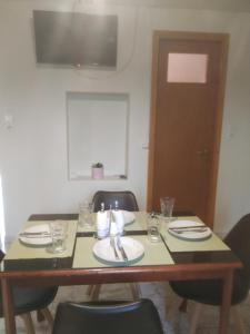 TV a/nebo společenská místnost v ubytování Eirini house