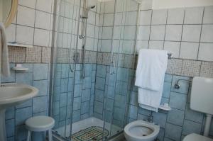 Koupelna v ubytování Hotel Vittoria