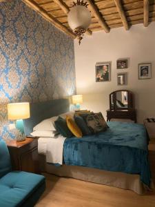 Postel nebo postele na pokoji v ubytování B&B Ventisei Scalini A Trastevere