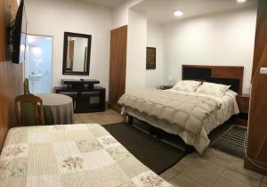 Cama ou camas em um quarto em Eco Hostal Offenbacher-Hof