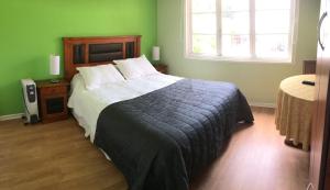 Cama ou camas em um quarto em Eco Hostal Offenbacher-Hof
