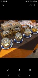 a table with plates of food on top at Albergo B&B Ristorante Grace in Vibo Valentia