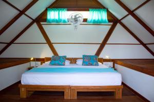מיטה או מיטות בחדר ב-Nubá Boutique Hostel Palomino