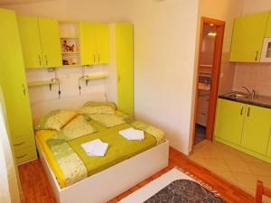 Postel nebo postele na pokoji v ubytování Apartments Marija - free parking