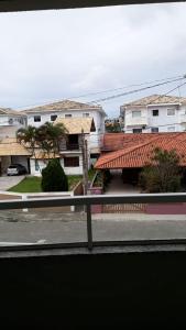 a view from a window of a street with buildings at RESIDENCIAL SANTANA 104 in Florianópolis