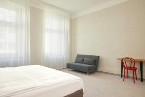 Letto o letti in una camera di Hotel Babula am Augarten