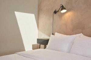 Letto o letti in una camera di Hotel Babula am Augarten