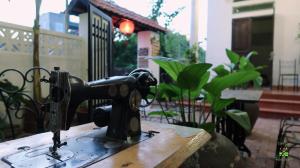 a sewing machine sitting on top of a table at Tam Coc Sweet Home in Ninh Binh