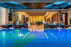 Bazén v ubytování Maximilan Danang Beach Hotel nebo v jeho okolí