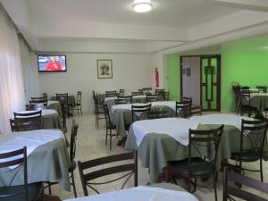 TV a/nebo společenská místnost v ubytování Grand Prix Hotel