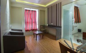 Posezení v ubytování Magnus Calypso Suites Viman Nagar