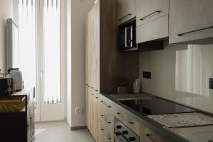 Kuchyň nebo kuchyňský kout v ubytování Urban Luxury Apartment Salerno + 19 fotografií