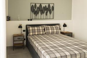 Postel nebo postele na pokoji v ubytování Urban Luxury Apartment Salerno