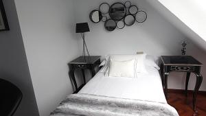 Postel nebo postele na pokoji v ubytování Apartamentos Spellos en Malpica