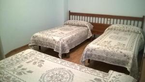 Postel nebo postele na pokoji v ubytování Hostal ** EC León