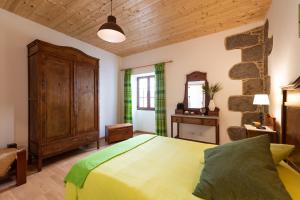 Posteľ alebo postele v izbe v ubytovaní Villa Canaria piscina jacuzzi jardín