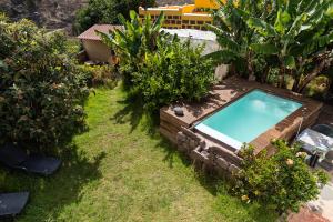 Bazén v ubytování Villa Canaria piscina jacuzzi jardín nebo v jeho okolí