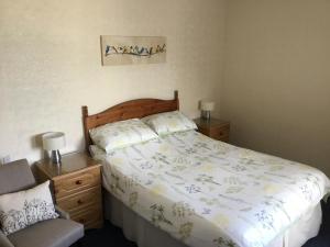 Кровать или кровати в номере Cavendish House