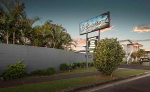 a sign for a hotel on the side of a street at Almare Tourist Motel in Ballina