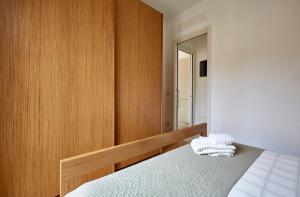 A bed or beds in a room at Apartment Alessandra