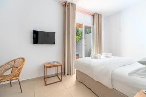 Posteľ alebo postele v izbe v ubytovaní Omnia Mykonos Boutique Hotel & Suites