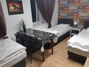 Posteľ alebo postele v izbe v ubytovaní Lorf Hostel&Coffee