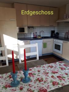 A kitchen or kitchenette at Ferienwohnung Neuheim